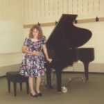 Jessica taking a bow after playing in her second piano recital. (6/13/1991)