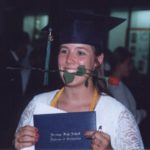 Jessica shows off her high school diploma after her graduation ceremony. (6/9/1995)