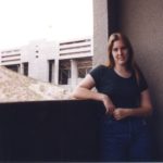 Jessica stands on her balcony at The Towers overlooking Sundevil Stadium. (1/3/1997)