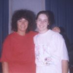 Jessica and Diane standing outside the pole barn in Mio, Michigan. (3/1/1998)