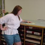 Jessica works on genealogy research at the Saginaw County Courthouse. (8/18/2000)