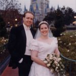Newlyweds Andrew and Jessica Green pose in front of Cinderella's Castle, at Walt Disney World. (2/2/2002)