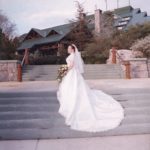 Jessica Green in her wedding gown in front of Wilderness Lodge, at Walt Disney World.