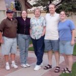 The Green family poses outside the home on Ross Drive in Chandler, Arizona: Jerald, Amy, Karen, Andrew, and Jessica. (8/18/2002)