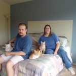 Andrew and Jessica pose with their three cats, Olly, Cheetoe, and Tumbleweed at the Gilbert home. (3/4/2004)