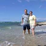 Andrew and Jessica stand in the waves of a Hawaiian beach. (9/5/2004)