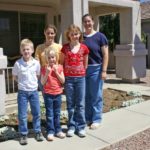 Jessica poses with her sister, nieces, and nephew outside her home. (3/31/2005)