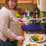 Jessica makes dinner - an actual dinner - after her sister Kathleen gave her a SavingDinner.com recipe subscription for Christmas. (12/31/2006)