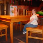 Jessica sits on an oversized chair in Seattle, Washington museum. (5/20/2007)