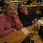 Karen and Jessica smile for the camera during a dinner show. (12/12/2009)