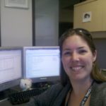 Jessica poses at her work desk at Maricopa Community Colleges District Office. (1/192012)