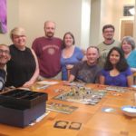 Jessica poses with members of the South Chandler Tabletop Gamers gaming group during a meetup at her home. (7/3/2016)