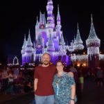 Andrew and Jessica pose in front Cinderella's Castle, which has been decorated for the holidays. (12/13/2016)