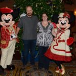 Andrew and Jessica take a photo with Mickey and Minnie Mouse. (12/21/2016)