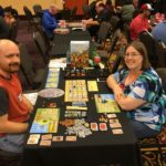 Jessica and Andrew playing the game A Feast for Odin at Meeplecon in Las Vegas, NV. (3/17/2017)